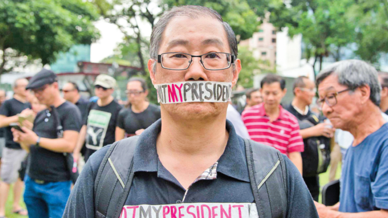 Singaporeans hold rare protest over presidential vote