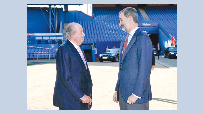 Spanish king distances himself from scandal-hit father