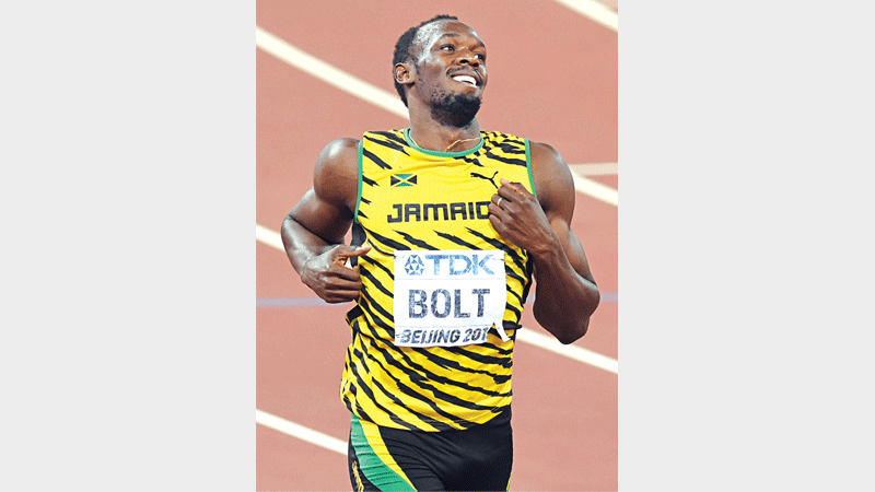 Bolt, Gatlin qualify for  World 200m final