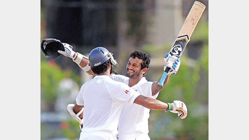 Karunaratne century keeps Sri Lanka ahead