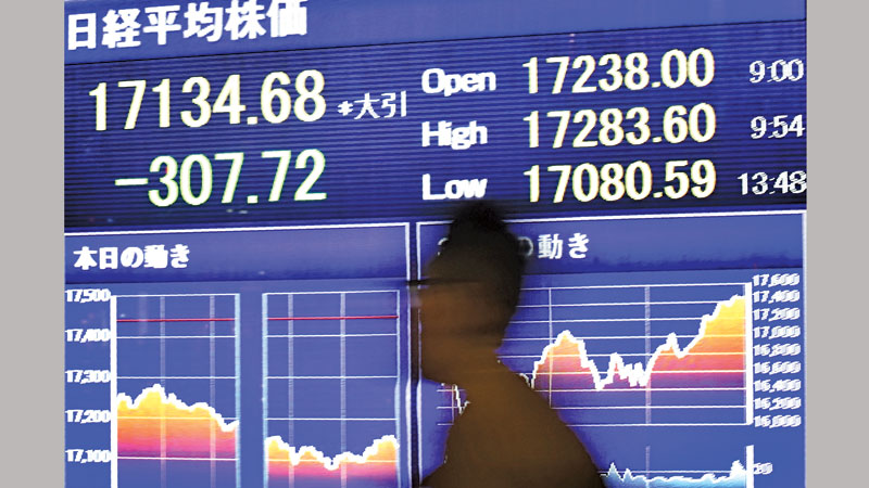 Asian markets struggle on US vote worries