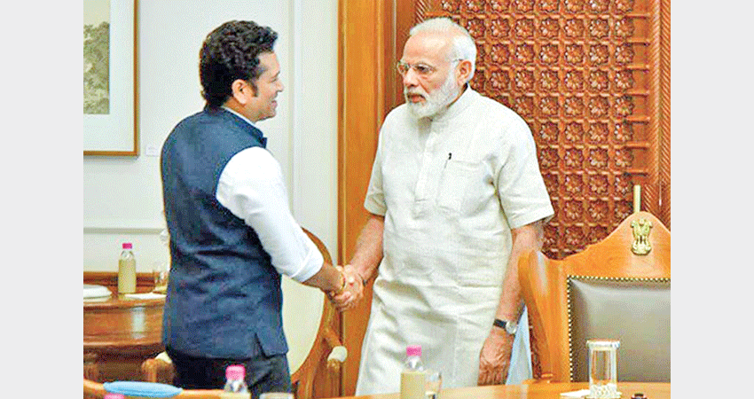 Tendulkar receives blessings from Modi