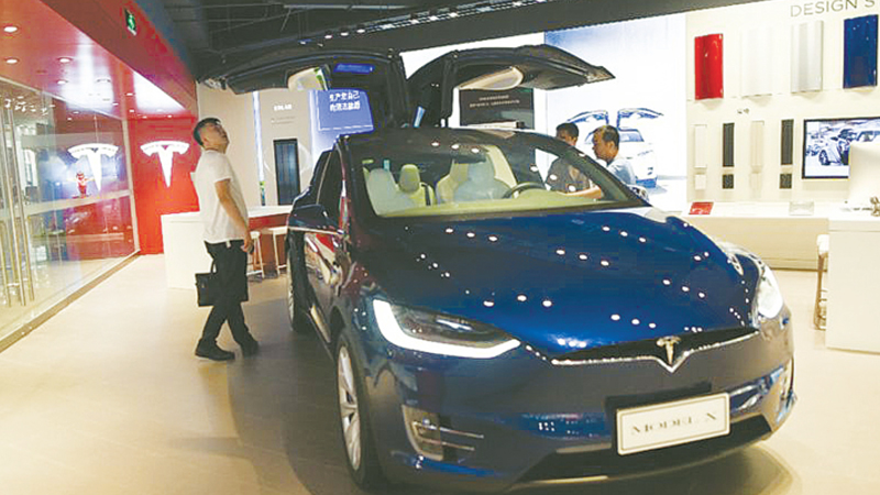 Tesla unveils Shanghai factory plans amid US-China trade row