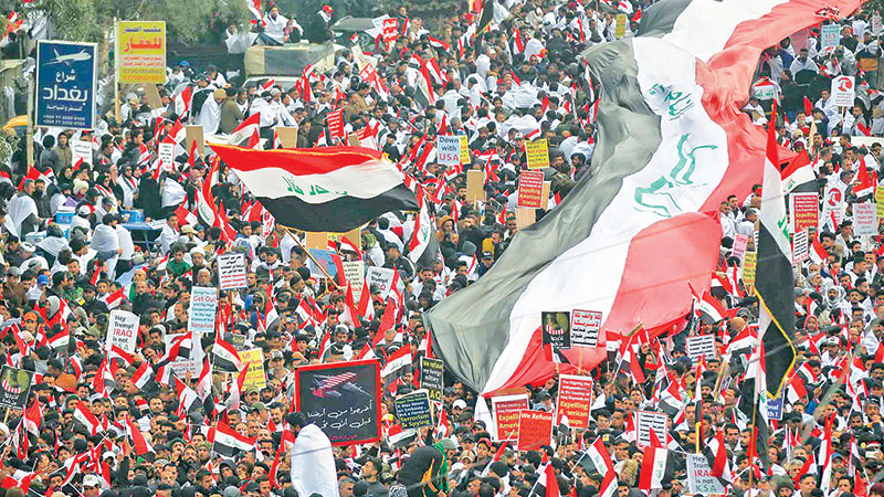 Thousands protest in Iraq to demand ouster of US troops

