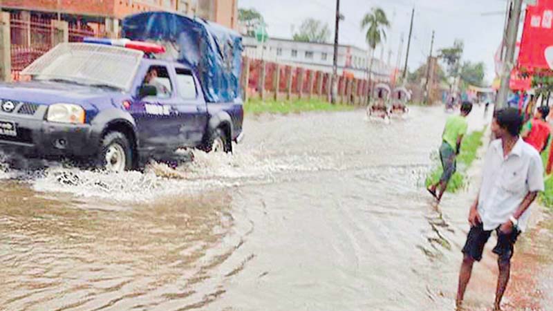 Heavy rains paralyse life in districts