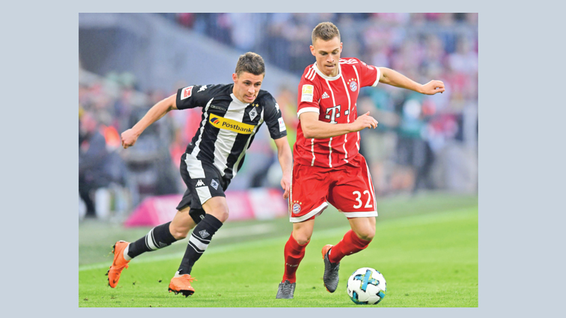 Treble-chasing Bayern thrash Gladbach