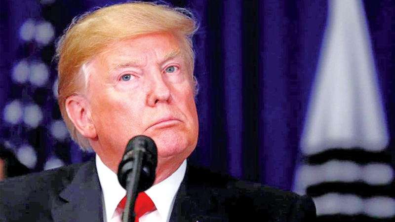 Trump shrugs off report revealing a fortune in tax dodges