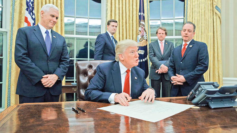 Trump signs executive order against ‘Obamacare’