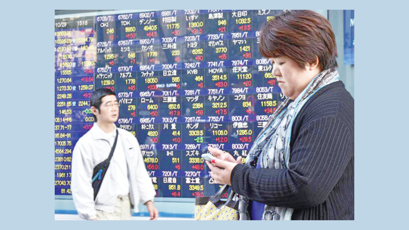 Asian markets mixed after strong US jobs data