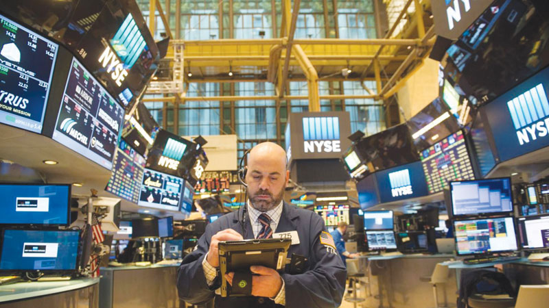 US stocks up, dollar down as Yellen signals likely rate hike