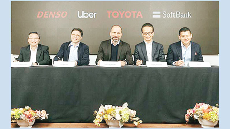 Uber wins $1b investment 
from Toyota, SoftBank fund