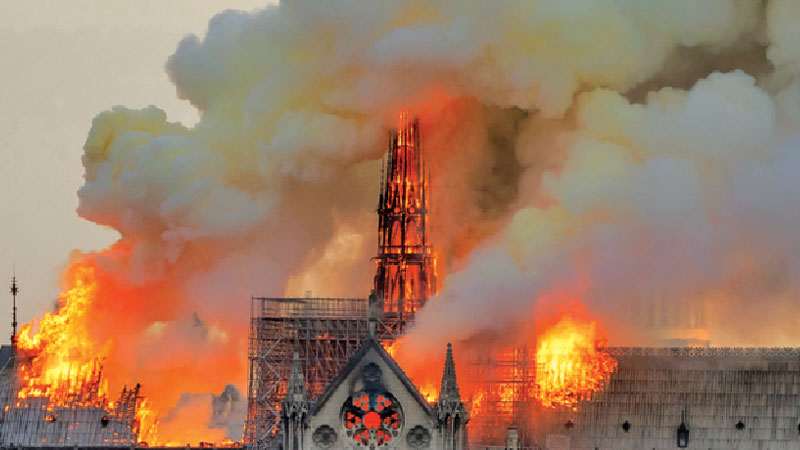 Workers questioned over fire as donations pour in