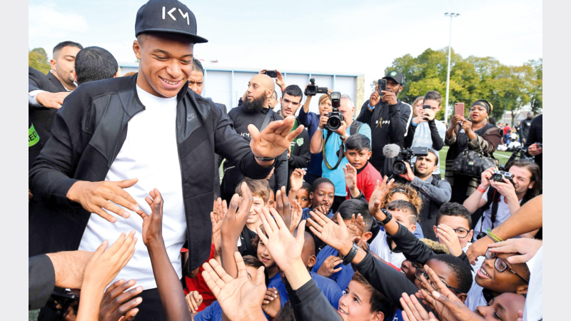 World Cup star Mbappe returns to his roots in Bondy