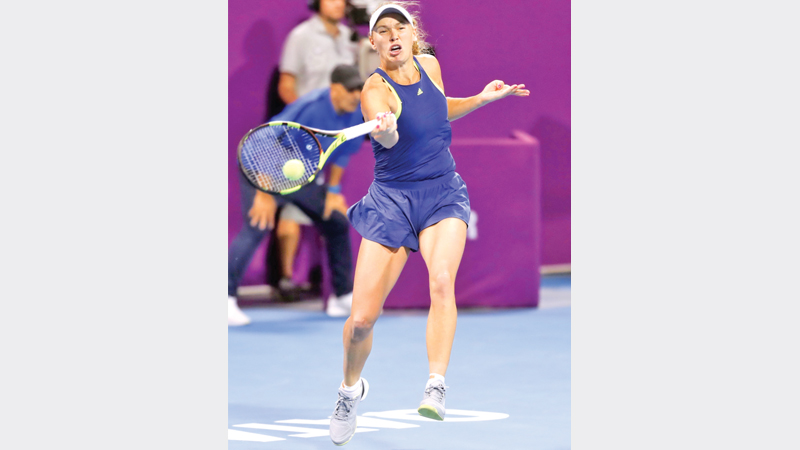 Wozniacki wins feisty match in Qatar 