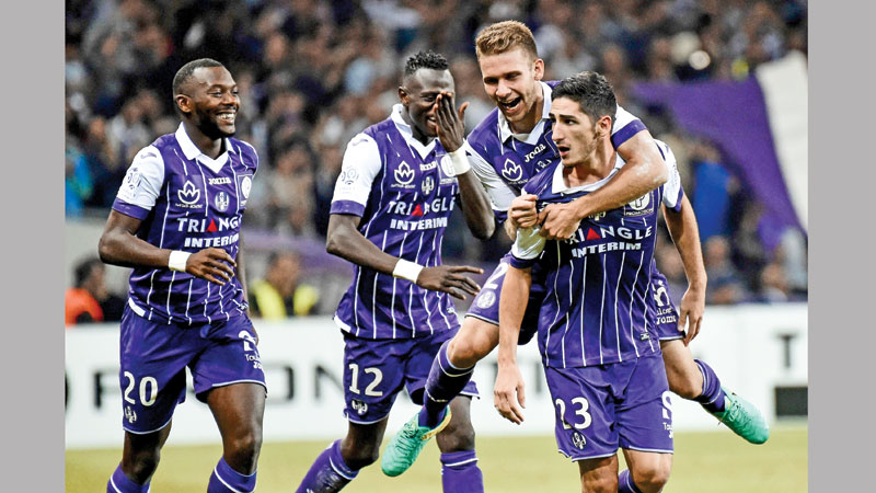 Toulouse stun 10-man PSG
