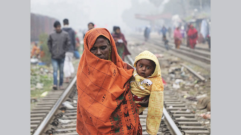 Country reels under cold wave, fog