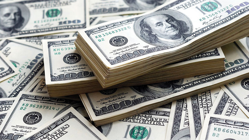 Dollar firms on Fed rate hike talk, Trump promises spending boost