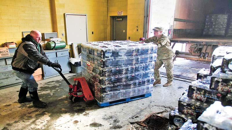 Obama declares emergency over foul water in Michigan