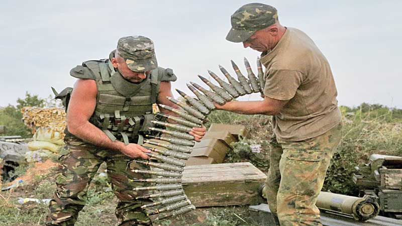 Ukraine leader accuses Russia of arms supplies to rebel east