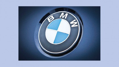 BMW profits slump as legal woes, investment costs bite