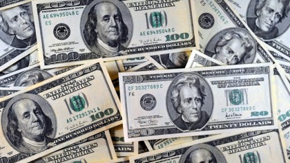 Dollar extends rally in Asia