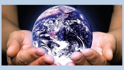 Earth in human hands 