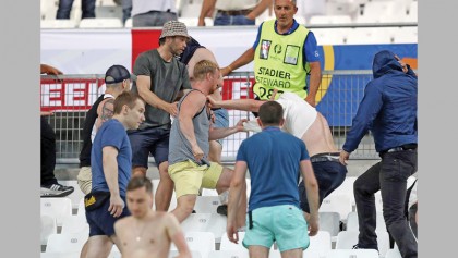 Russia hold England amid bruising day for football 