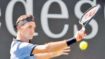 Haas shocks Federer on return after three months