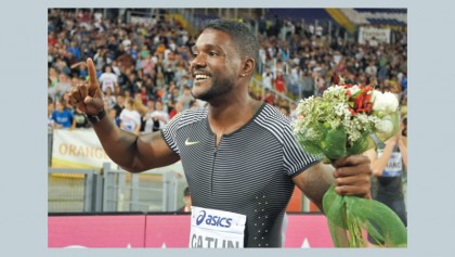 Gatlin digs deep, Ayana misses world record