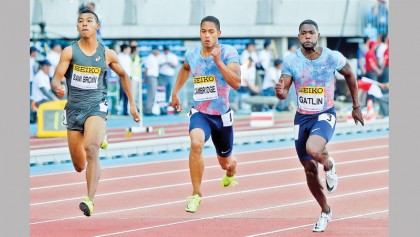 Gatlin struggles to victory in Japan