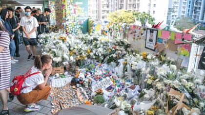 Huge HK rally after student dies