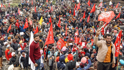 Indian police open fire to clear strike protests