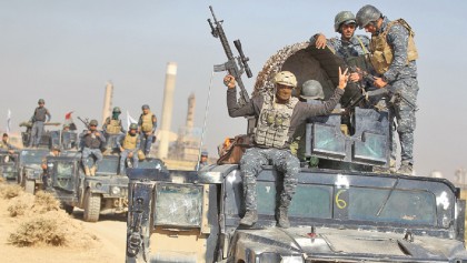 Iraqi forces capture key sites from Kurds