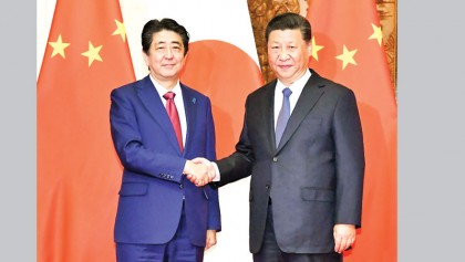 Japan, China strike deals as ties improve