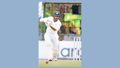 Karunaratne again anchors SL 