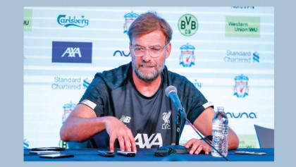 Klopp committed to Reds for at least three more years 