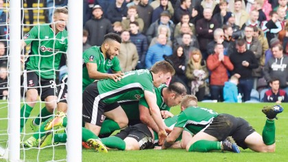 Lincoln, Millwall claim famous upsets