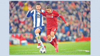 Liverpool ease into Champions League quarters