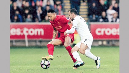 Milner spots on as Reds sink Swansea 
