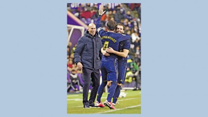 Madrid go top with gritty win