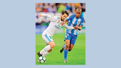 Isco leads Real to Malaga win