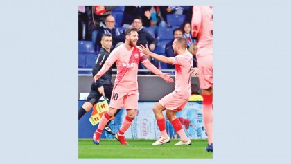 Messi free-kick magic keeps Barca top