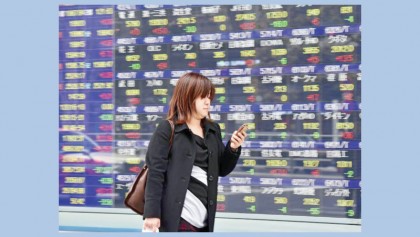 Most Asian markets up but 
trade row rumbles on