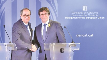 Puigdemont vows to press on with independence bid