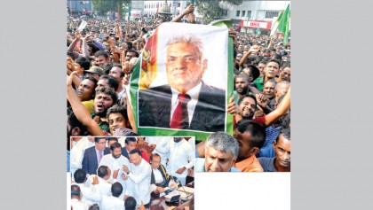 Punch-up in parliament as thousands rally in Sri Lanka 
