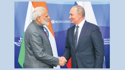 Putin, Modi vow to boost military, trade ties