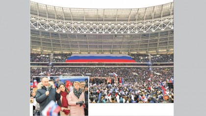 Putin promises 
‘victories’ at 
star-studded rally