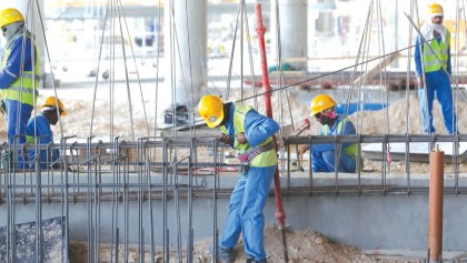 Qatar’s migrant workers on Gulf crisis frontline