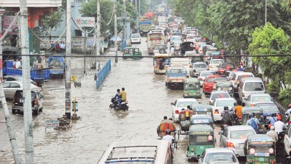 Rain disrupts Dhaka life