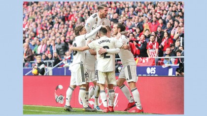 Real Madrid triumph in derby 